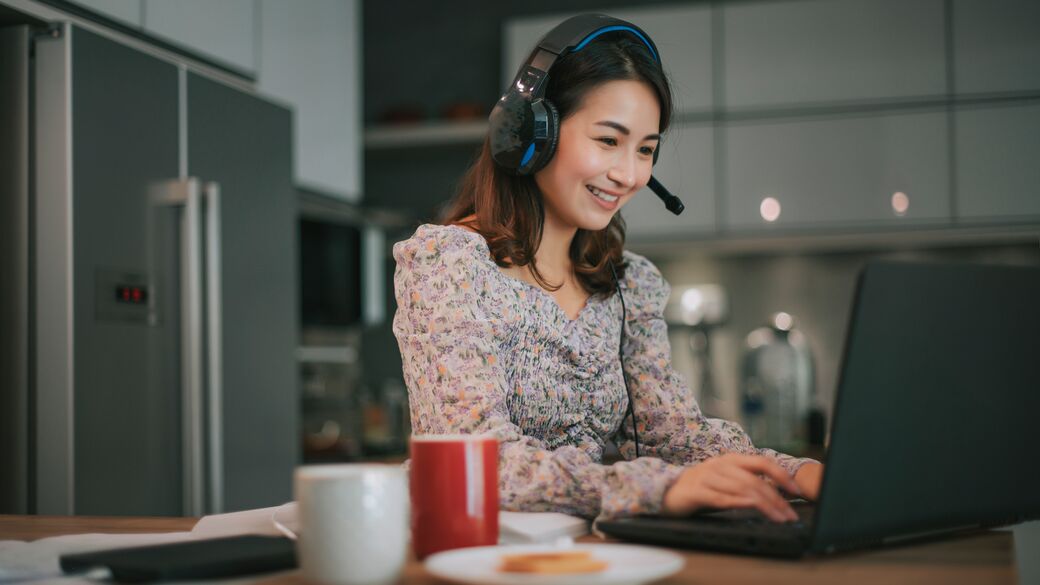 corp-asian-woman-in-a-meeting-from-home.jpg