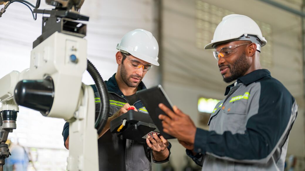 mfg-two-industry-engineers-working-in-the-factory-workshop.jpg